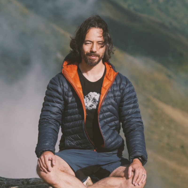 Kitaro Waga practising breathwork outdoors